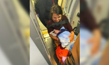 Woman gives birth on Delta flight with the help of Atlanta firefighters.