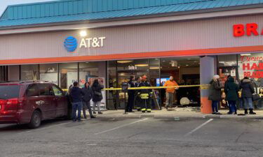 Seven people were hurt when an SUV drove into an AT&T Store at a strip mall in Indianapolis