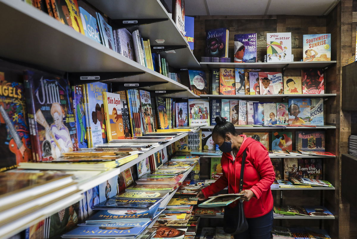 <i>Erin Clark/The Boston Globe/Getty Images</i><br/>A patron browses in the children's book section at Frugal Bookstore in Boston on Nov. 28