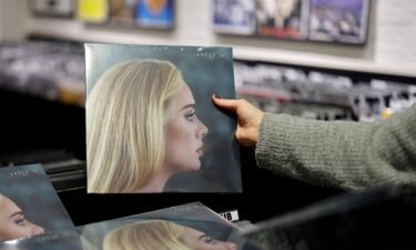 A member of staff sorts copies of Adele's new album "30" in Sister Ray record store in central London on November 19.