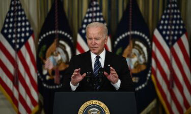 US President Joe Biden delivers remarks on the October jobs report from the State Dining Room of the White House in Washington