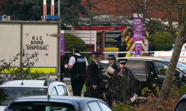 UK police arrested three young men after a car explosion killed one person and left another injured near a Liverpool hospital.