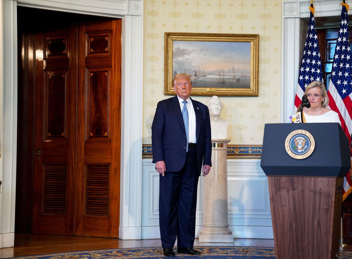 <i>Anna Moneymaker/Pool/Sipa</i><br/>President Donald Trump listens as Cleta Mitchell speaks at a signing ceremony for a proclamation honoring the 100th Anniversary of the Ratification of the 19th Amendment in the Blue Room of the White House in Washington