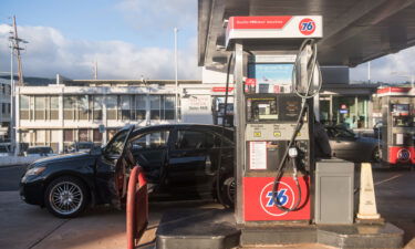 A vehicle refuels at a 76 gas station in the Kaimuki neighborhood of Honolulu