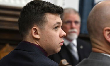 Dr. John Black testifies as Kyle Rittenhouse watches during his trial at the Kenosha County Courthouse  on Thursday