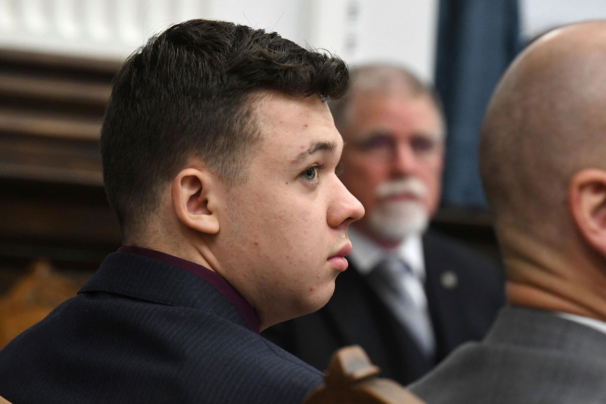 <i>Mark Hertzberg/ZumaPress/Pool/AP</i><br/>Dr. John Black testifies as Kyle Rittenhouse watches during his trial at the Kenosha County Courthouse  on Thursday