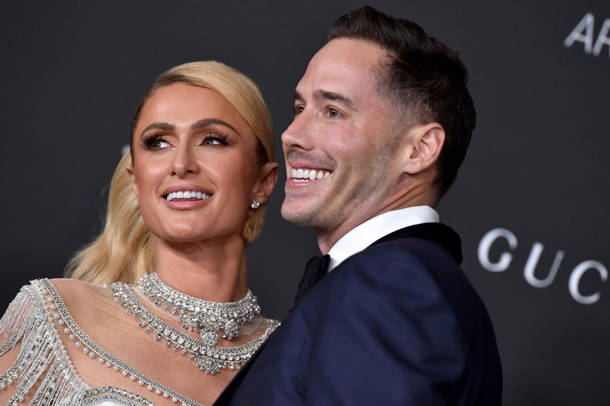 <i>Axelle/Bauer-Griffin/FilmMagic/Getty Images</i><br/>Paris Hilton (left) tied the knot with fiancé Carter Reum on November 11 in Los Angeles