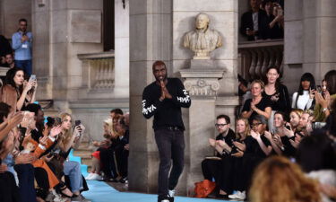 Fashion designer Virgil Abloh for Off-white acknowledges the audience at the end of the 2017 Spring/Summer ready-to-wear collection fashion show