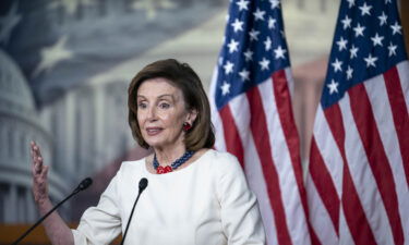 House Speaker Nancy Pelosi reaffirmed House Democrats plan to pass President Joe Biden's roughly $1.9 trillion economic and climate bill next week. Pelosi is shown here at the U.S. Capitol building on November 4