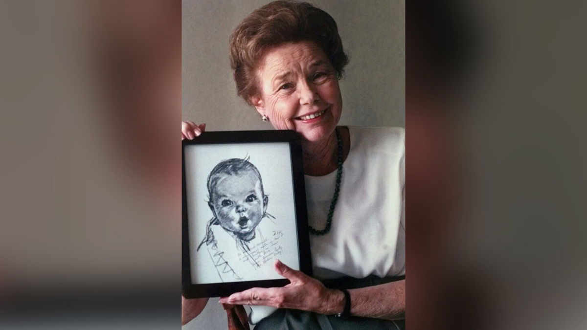 <i>Gerber Products/AP</i><br/>Ann Turner Cook holds a picture of the Gerber Baby sketch in a 1998 photo. Original Gerber Baby Ann Turner Cook