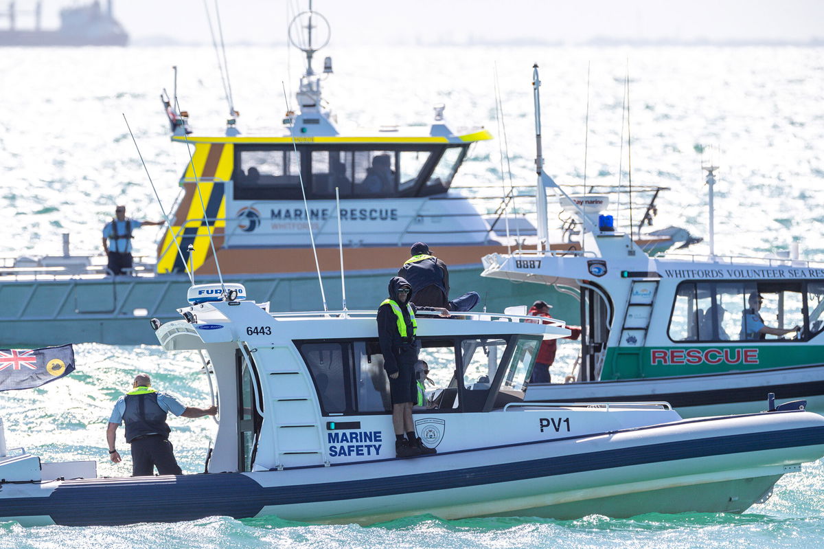 <i>Richard Wainwright/AAP Image/Reuters</i><br/>Search and Rescue vessels are seen patrolling off Port Beach in North Fremantle