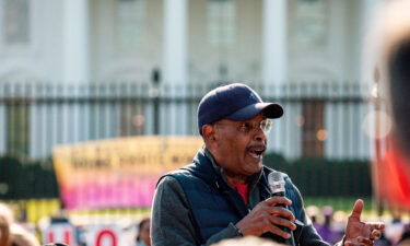 Radio personality Joe Madison speaks during a rally and civil disobedience action at the White House.