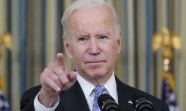 President Joe Biden calls on reporters for questions as he speaks about the bipartisan infrastructure bill in the State Dinning Room of the White House