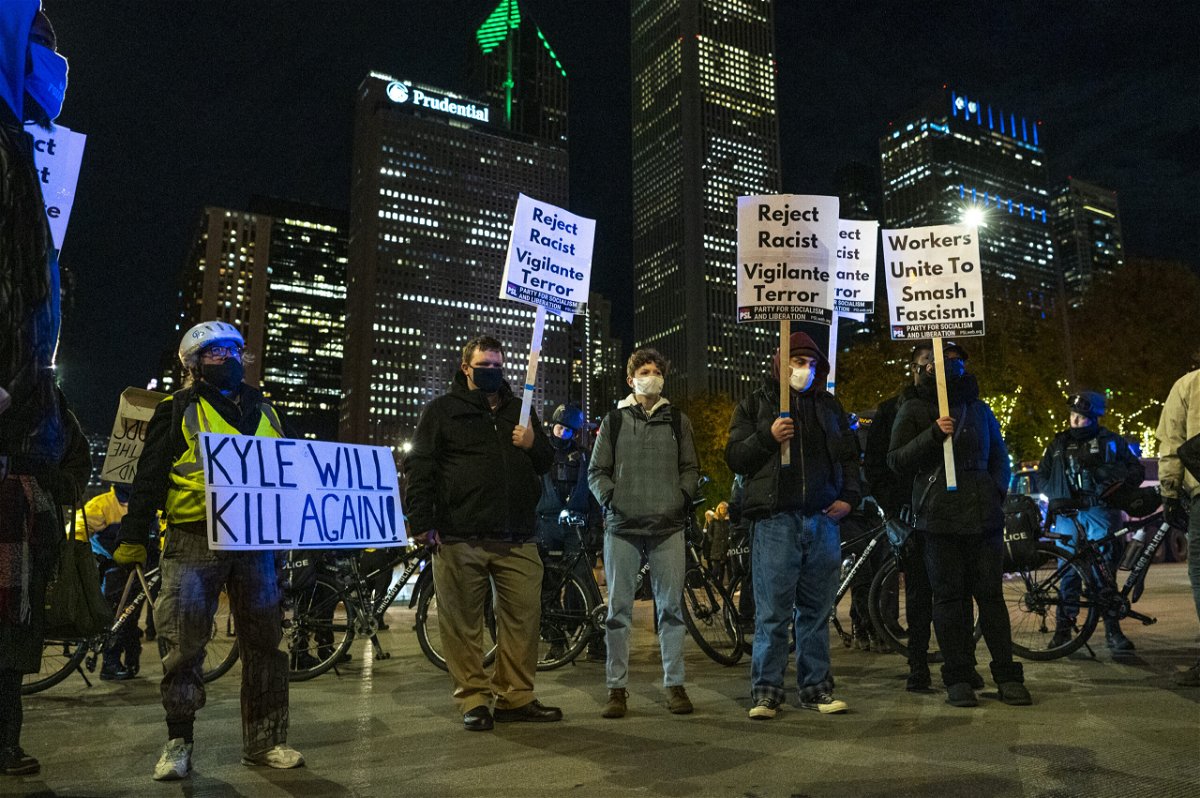 <i>Tyler LaRiviere/Chicago Sun-Times/AP</i><br/>Demonstrators in Chicago marched around the city's Loop on the night of November 19.