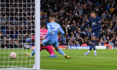 Manchester City came from behind to defeat Paris Saint-Germain 2-1 on Wednesday as both teams qualified for the knockout stages of the Champions League.