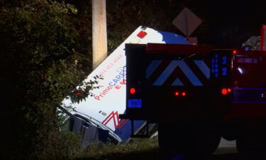 The ambulance veered off the shoulder of the road causing it to roll over into a ditch in Fairburn