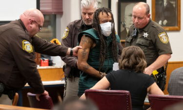 Darrell Brooks (center) makes his initial court appearance in Waukesha