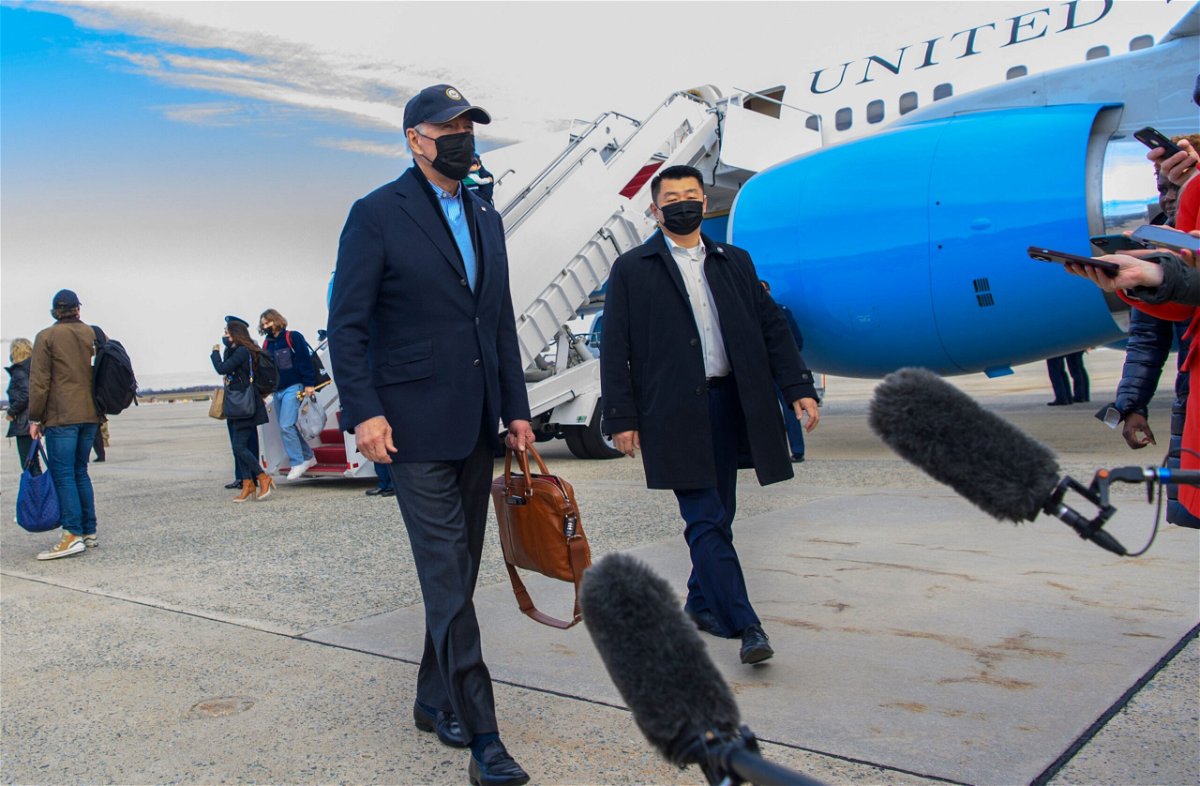 <i>MANDEL NGAN/AFP/GETTY IMAGES</i><br/>President Joe Biden speaks to reporters upon arrival at Joint Base Andrews