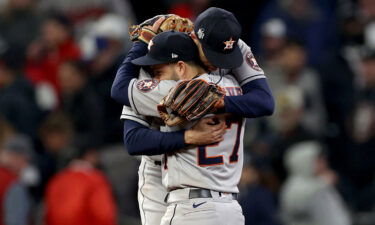 Carlos Correa and Jose Altuve of the Houston Astros celebrate the team's 9-5 win against the Atlanta Braves in Game 5.