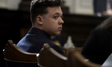 A second juror in Kyle Rittenhouse's homicide trial was dismissed in as many days on Friday due to an issue with her pregnancy. Rittenhouse is shown here as his lawyer gives opening statements to the jury at the Kenosha County Courthouse in Kenosha