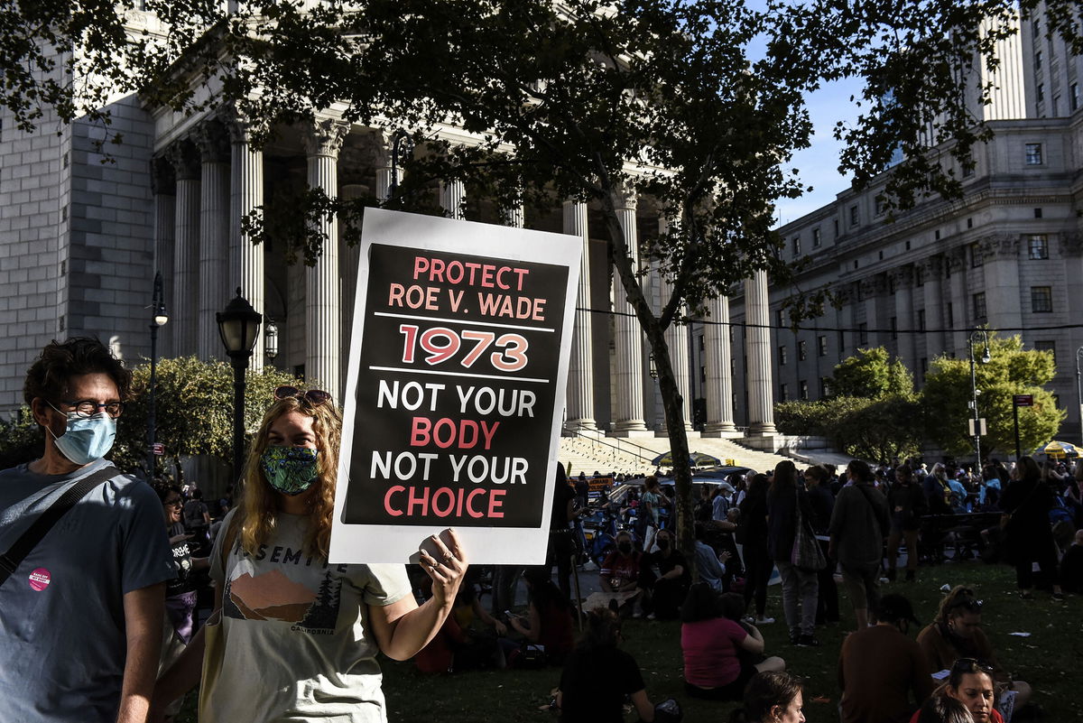 <i>Stephanie Keith/Bloomberg/Getty Images</i><br/>A demonstrator holds a 