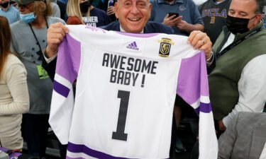 Vitale displays a Vegas Golden Knights jersey he was given with his catchphrase "Awesome