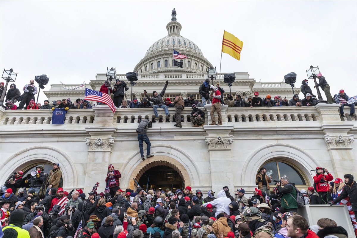 <i>Lev Radin/Pacific Press/LightRocket/Getty Images</i><br/>Protesters seen all over Capitol building where pro-Trump supporters riot and breached the Capitol. Rioters broke windows and breached the Capitol building in an attempt to overthrow the results of the 2020 election.
