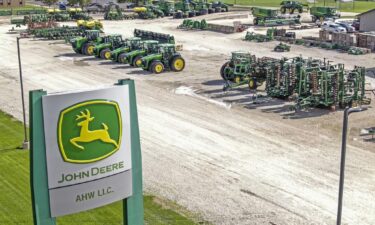 John Deere posted record annual income Wednesday despite the recently concluded five-week worker strike