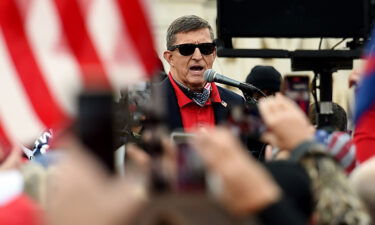 Former Trump national security adviser Michael Flynn's call for "one religion" in the US to win the battle of good versus evil has garnered sharp backlash from a range of critics. Flynn is shown here speaking to supporters of US President Donald Trump during the Million MAGA March to protest the outcome of the 2020 presidential election in front of the US Supreme Court on December 12