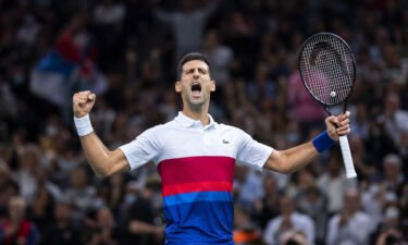 Novak Djokovic celebrates victory against Hurkacz at the Paris Masters.