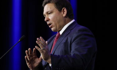 Republicans seeking to energize their core voters and appeal beyond their base are turning to the Biden administration's vaccine mandates. Florida Gov. Ron DeSantis is seen here at a Republican Jewish Coalition meeting in Las Vegas.