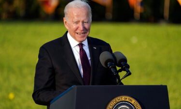 President Joe Biden asked the Federal Trade Commission on Wednesday to "immediately" investigate whether illegal activity by oil and gas companies is pushing up gas prices. Biden is shown here on the South Lawn of the White House