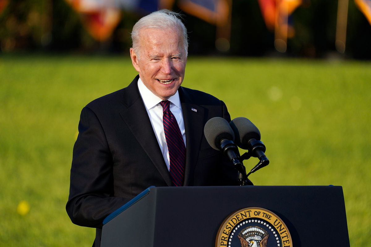 <i>Evan Vucci/AP</i><br/>President Joe Biden speaks before signing the 