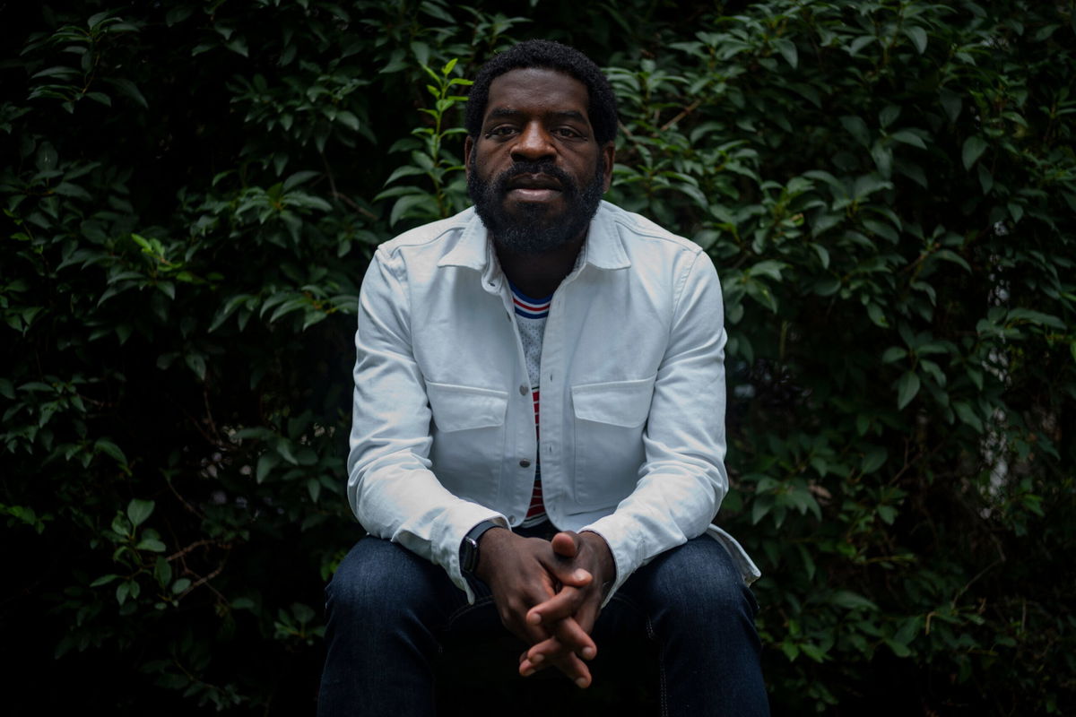 <i>Joshua A. Bickel/Columbus Dispatch/USA Today Network</i><br/>Poet Hanif Abdurraqib sitting for a portrait outside his home in Columbus