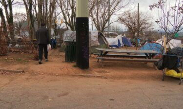 A homeless camp of about 35 tents along Interstate 240 will be removed by week's end