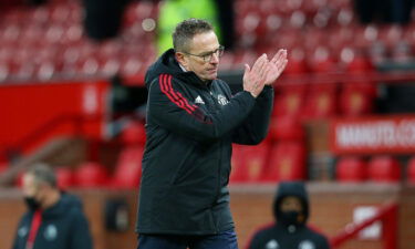 Ralf Rangnick applauds the Manchester United crowd following the club's victory against Crystal Palace.