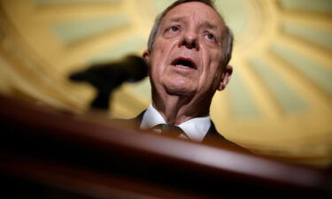 Democrats hope to make progress on Build Back Better in the new year as action stalls for now. Senator Dick Durbin is seen here at the U.S. Capitol on December 14