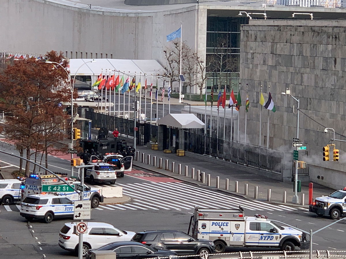 <i>Benno Schwinghammer/picture alliance via Getty Images</i><br/>Police patrol cars outside the United Nations headquarters in New York on December 2