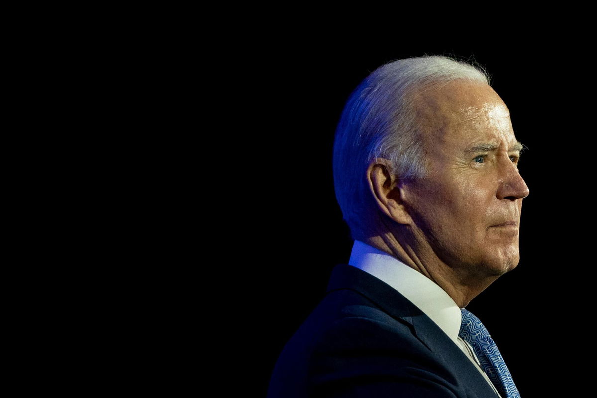 <i>Alex Edelman/AFP/Getty Images</i><br/>President Joe Biden speaks during a holiday reception for the Democratic National Committee in Washington