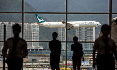 A Cathay Pacific aircraft coming in to land at Hong Kong International Airport in August.