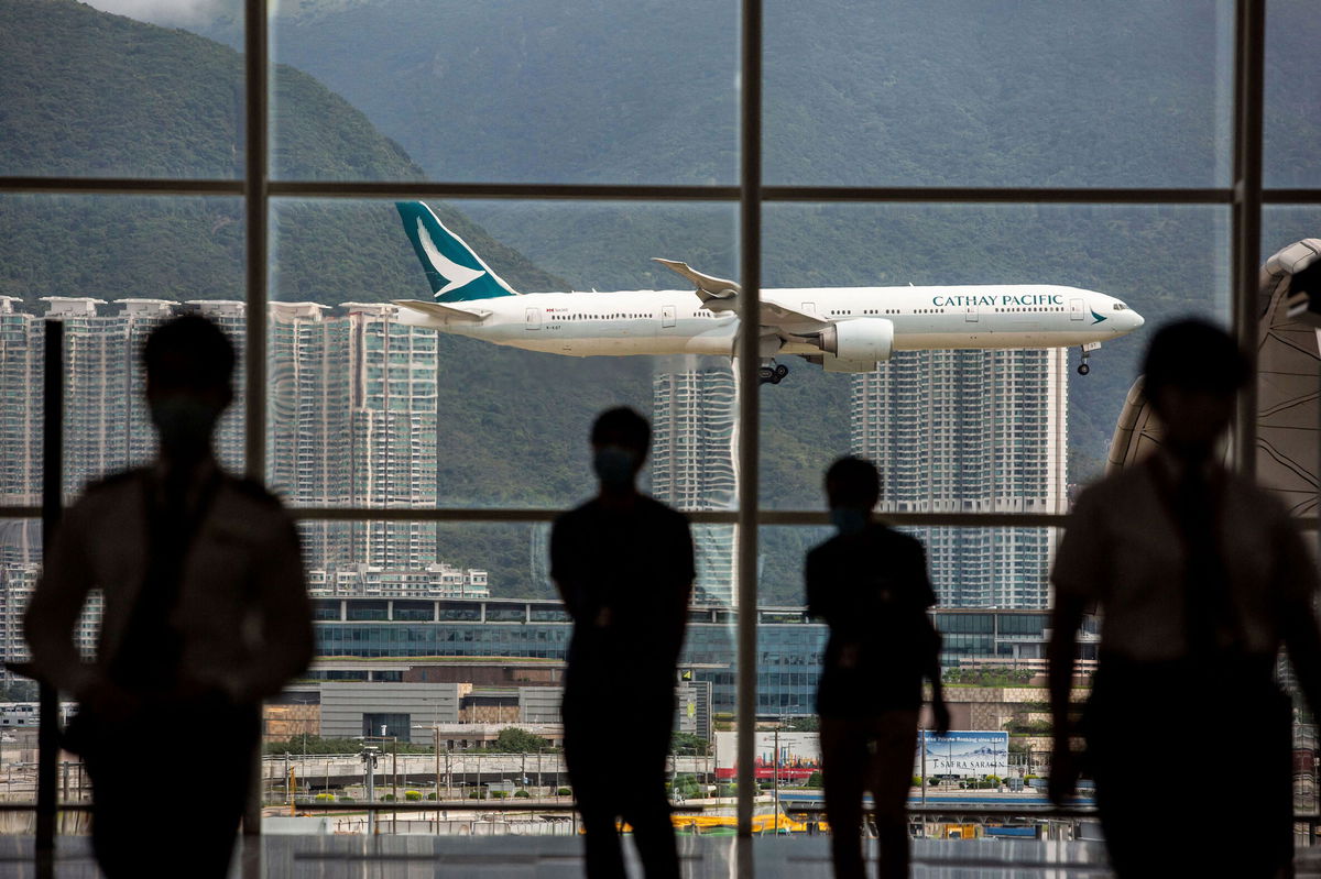 <i>Isaac Lawrence/AFP/Getty Images</i><br/>A Cathay Pacific aircraft coming in to land at Hong Kong International Airport in August.