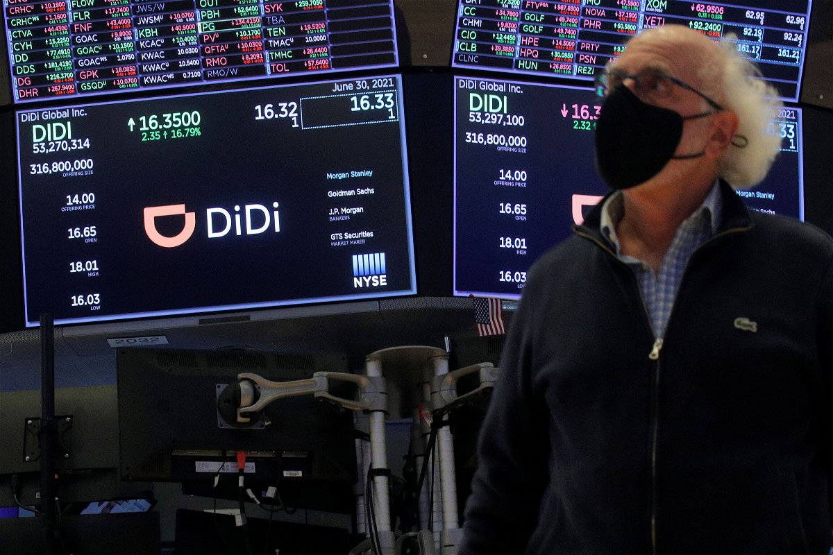 <i>Brendan McDermid/Reuters</i><br/>Traders work during the IPO for Chinese ride-hailing company Didi Global Inc on the New York Stock Exchange floor in New York on June 30.