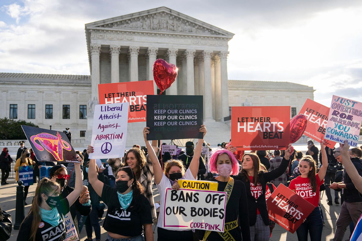 <i>Drew Angerer/Getty Images</i><br/>One hundred days after allowing a Texas law that bars abortion after the first six weeks of pregnancy to go into effect -- sending women scrambling to neighboring states to obtain a procedure protected by the Constitution -- the Supreme Court gave supporters of abortion rights little to celebrate.