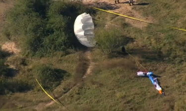 Two people are dead after a plane collided with a paraglider outside of Fulshear