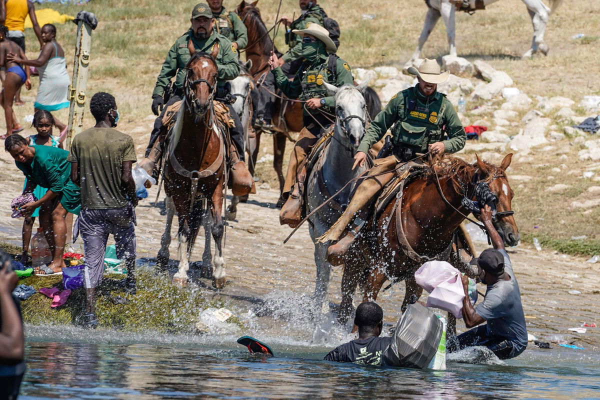 <i>Paul Ratje/AFP/Getty Images</i><br/>A group of Haitian migrants is suing the Biden administration over its treatment of migrants