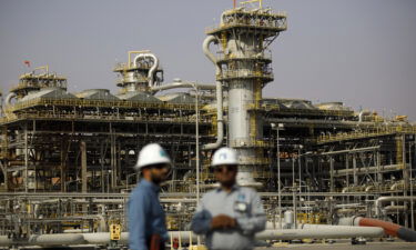 Employees visit the Natural Gas Liquids (NGL) facility at Saudi Aramco's Shaybah oil field in the Rub' Al-Khali desert