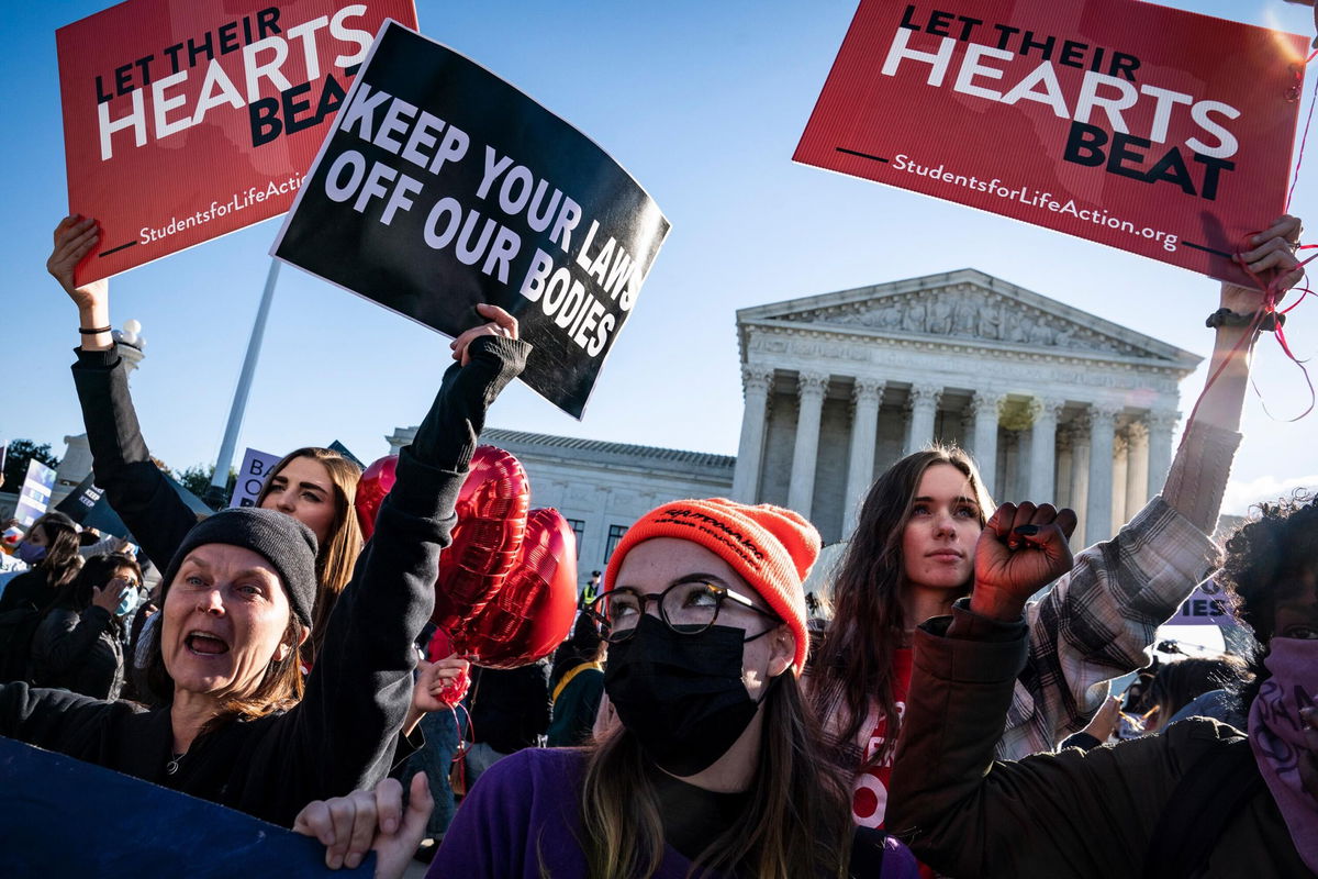 <i>Jabin Botsford/The Washington Post/Getty Images</i><br/>The Supreme Court lets Texas abortion law continue but says providers can sue.