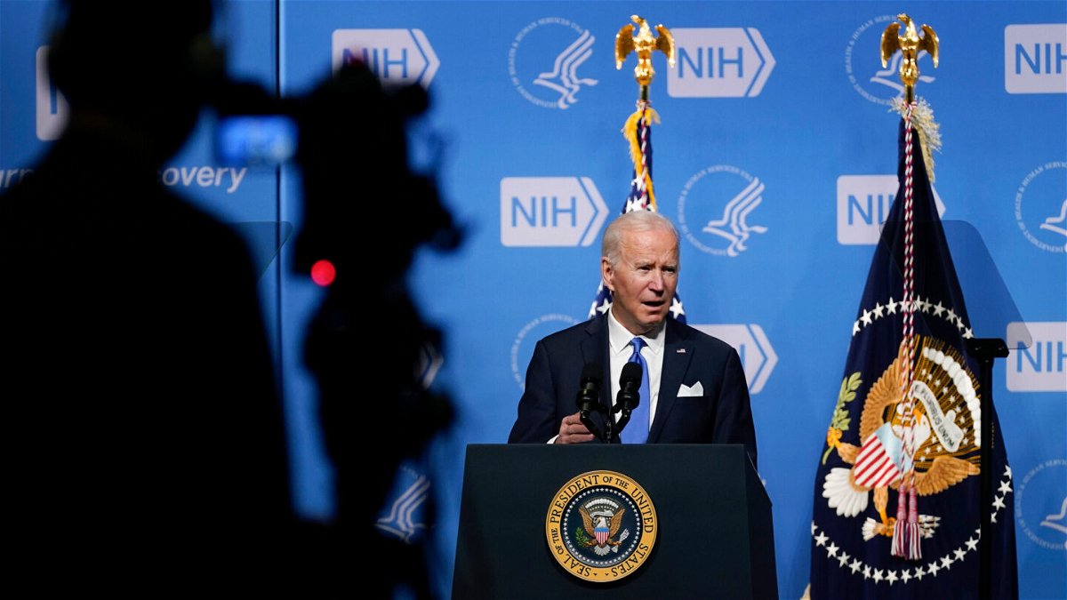 <i>Evan Vucci/AP</i><br/>President Joe Biden speaks about the Omicron varient during a visit to the National Institutes of Health in Bethesda