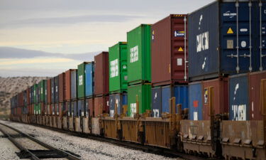 A freight train carries cargo shipping containers in the El Paso Sector along the US-Mexico border between New Mexico and Chihuahua state on December 9 in Sunland Park