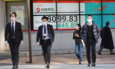 Asian stock markets followed Wall Street lower on Monday amid concern about the coronavirus's latest variant and tighter Federal Reserve policy.